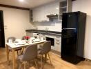 Modern kitchen with dining area