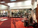 Spacious gym with modern exercise equipment