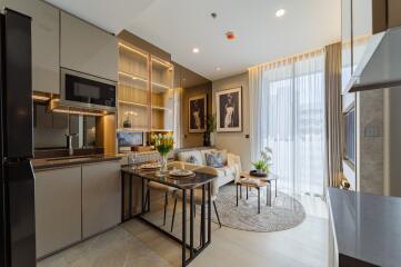 Modern living room with kitchenette and dining area