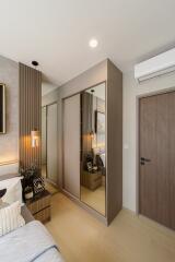 Modern bedroom with built-in wardrobe