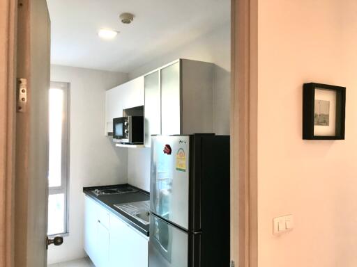 Modern kitchen with stainless steel appliances