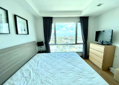 Bright bedroom with city view