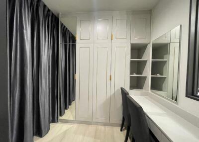 Bedroom with wardrobe and study area