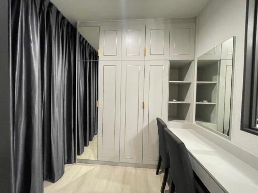 Bedroom with wardrobe and study area