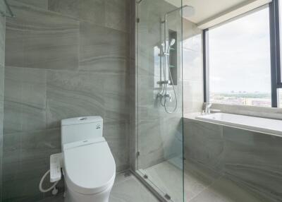 Modern bathroom with glass shower and bathtub