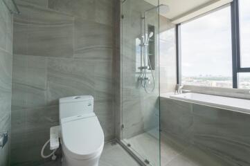 Modern bathroom with glass shower and bathtub