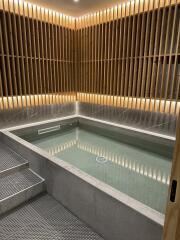 Modern bathroom with soaking tub and wooden wall paneling