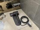 Bathroom countertop with hairdryer and mirror