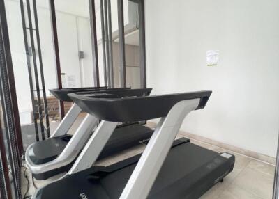 exercise room with treadmills