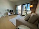 Modern living room with a large window and city view