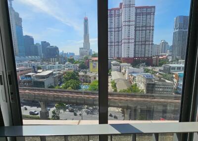 Cityscape view from a high-rise window