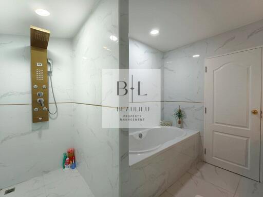 Modern bathroom with a walk-in shower and bathtub