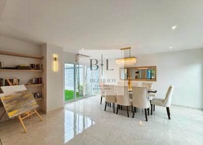 Spacious modern dining room with large windows