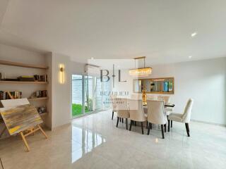 Spacious modern dining room with large windows