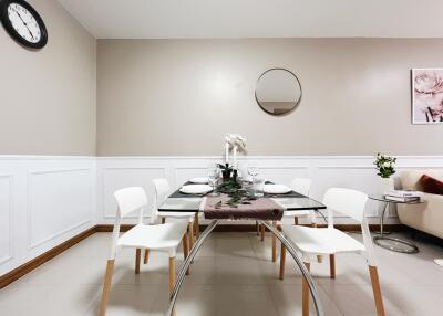 Contemporary dining room with seating for four and stylish decor