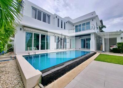 Modern two-story house with a swimming pool