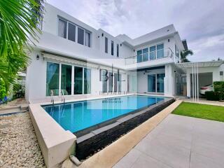 Modern two-story house with a swimming pool