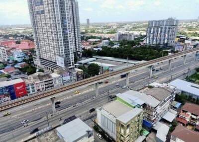 Aerial view of urban buildings with highway