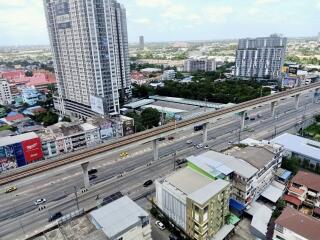 Aerial view of urban buildings with highway