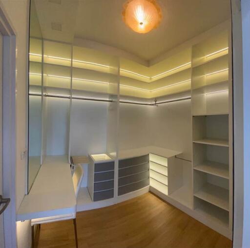 Spacious walk-in closet with ample storage space