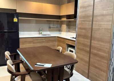 Modern kitchen with dining table and chairs