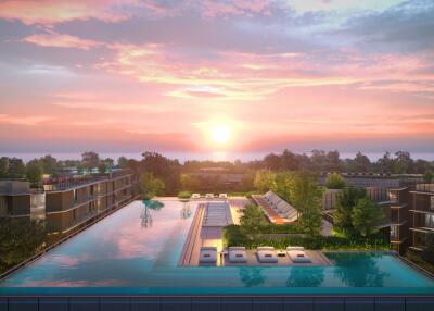 Luxurious residential complex with an infinity pool at sunset