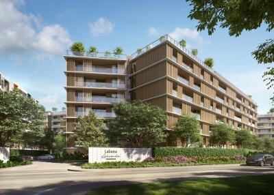 Modern residential building exterior with green landscaping