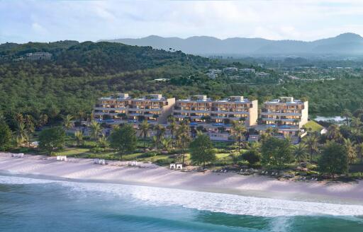 Beachfront luxury apartments with scenic mountain backdrop