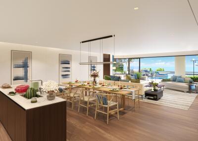 Spacious open living area with dining table and ocean view