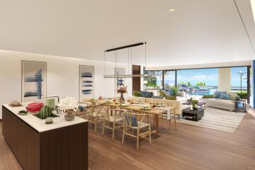 Spacious open living area with dining table and ocean view