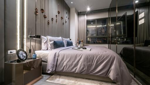 Modern bedroom with stylish decor and large window