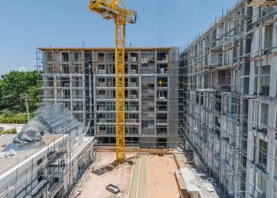 Construction site of a multi-story building with a crane