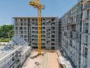 Construction site of a multi-story building with a crane