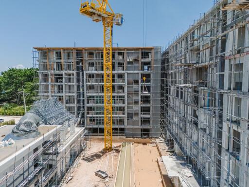 Construction site of a multi-story building with a crane