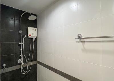 Modern bathroom with shower and water heater