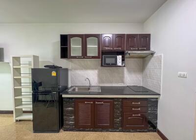 Modern kitchen with appliances and cabinetry