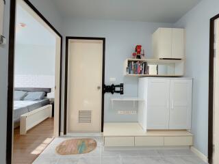 Bedroom with storage and bed