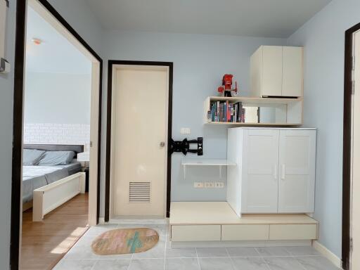 Bedroom with storage and bed