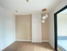 Minimalist bedroom with modern pendant lights