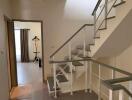 Modern staircase and hallway with natural lighting