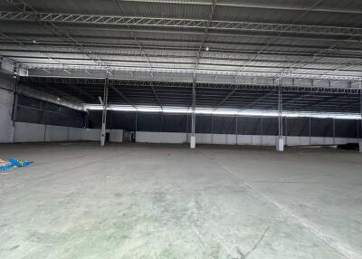 Spacious empty warehouse with high ceilings