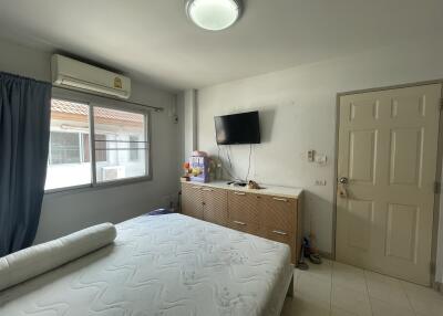 Spacious bedroom with natural lighting