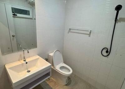 Modern bathroom with toilet and sink