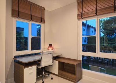 Modern home office with large windows