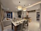 Modern open-concept living and dining area with kitchen