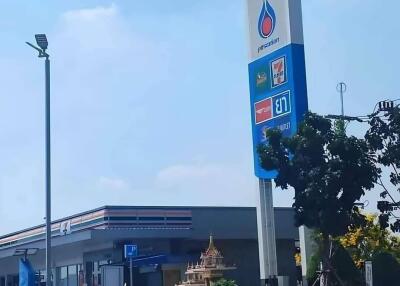 PTT gas station 500 meters sign