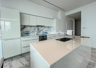 Modern kitchen with island and marble accents