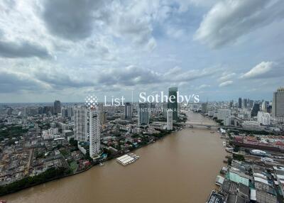 Aerial view of city buildings by a river