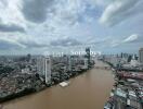 Aerial view of city buildings by a river