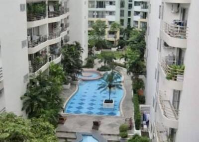 View of residential buildings with swimming pools